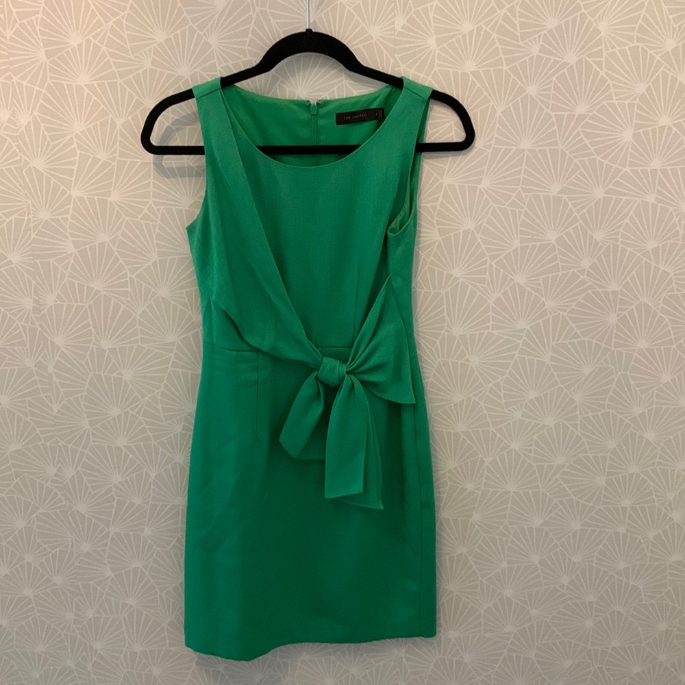 The limited tie dress perfect for the working girl boss or a tea party brunch